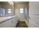 Bright bathroom featuring a double sink vanity, shower and tub combo, and modern fixtures at 710 W Ardmore Rd, Phoenix, AZ 85041