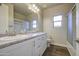 Bright bathroom featuring a double sink vanity, shower and tub combo, and modern fixtures at 710 W Ardmore Rd, Phoenix, AZ 85041