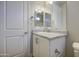 Bathroom featuring a granite countertop and white cabinetry at 710 W Ardmore Rd, Phoenix, AZ 85041