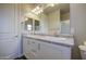 Bright bathroom featuring a double sink vanity, shower and tub combo, and modern fixtures at 710 W Ardmore Rd, Phoenix, AZ 85041