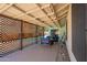 Charming covered patio with stylish furniture, perfect for outdoor entertaining at 7940 W Willow Ave, Peoria, AZ 85381