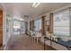 Sun room featuring multiple windows and a sliding glass door to the patio at 7940 W Willow Ave, Peoria, AZ 85381