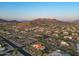 Stunning aerial view of the community, showcasing the desert landscape and mountain views at 8540 E Mcdowell Rd # 119, Mesa, AZ 85207