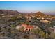 An aerial view of the property showcases its landscaping and proximity to mountain views at 8540 E Mcdowell Rd # 119, Mesa, AZ 85207
