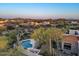 Beautiful aerial view showcasing a desert home with a pool surrounded by desert landscaping at 8540 E Mcdowell Rd # 119, Mesa, AZ 85207