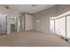 A spacious carpeted bedroom features walk-in closets and neutral paint ready for personalization at 8540 E Mcdowell Rd # 119, Mesa, AZ 85207