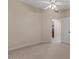 Neutral bedroom featuring plush carpeting, ceiling fan, and a doorway to an adjacent space at 8540 E Mcdowell Rd # 119, Mesa, AZ 85207