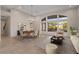 Formal dining and living room with expansive windows and views of the outside at 8540 E Mcdowell Rd # 119, Mesa, AZ 85207
