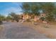 Paver driveway leads to a well-maintained home with desert landscaping at 8540 E Mcdowell Rd # 119, Mesa, AZ 85207