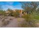 Lush desert landscaping surrounds this stunning house at 8540 E Mcdowell Rd # 119, Mesa, AZ 85207