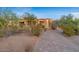 Landscaped front yard featuring desert plants and a curved brick driveway at 8540 E Mcdowell Rd # 119, Mesa, AZ 85207