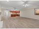 Open concept living area features a kitchen with shaker cabinets at 8540 E Mcdowell Rd # 119, Mesa, AZ 85207