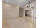 Open living area with tile floors, a decorative chandelier, and access to a sitting room at 8540 E Mcdowell Rd # 119, Mesa, AZ 85207