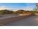 Rooftop deck offering panoramic views of the mountains and surrounding desert landscape at 8540 E Mcdowell Rd # 119, Mesa, AZ 85207