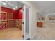 Elegant wine room with custom shelving and decorative lighting for storing a vast wine collection at 8540 E Mcdowell Rd # 119, Mesa, AZ 85207