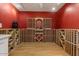 Interior wine room with custom shelves and wood flooring at 8540 E Mcdowell Rd # 119, Mesa, AZ 85207