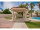 Picturesque gazebo near a refreshing pool, set in a beautifully landscaped backyard at 10130 E San Salvador Dr, Scottsdale, AZ 85258