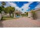 Backyard view featuring a gazebo, swimming pool, and lush landscaping at 10130 E San Salvador Dr, Scottsdale, AZ 85258