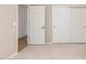 View of hallway featuring bedroom and closet entrances at 10130 E San Salvador Dr, Scottsdale, AZ 85258