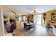 Open-concept dining room with stylish lighting and seamless transition to other living spaces at 10441 W Windsor Ave, Avondale, AZ 85392