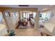 View of the dining and living areas featuring elegant furnishings and neutral décor at 10441 W Windsor Ave, Avondale, AZ 85392