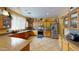 Spacious kitchen with stainless steel appliances, tile backsplash, and ample cabinetry at 10441 W Windsor Ave, Avondale, AZ 85392
