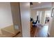 View of the home office with hardwood flooring, natural light and an office setup at 10441 W Windsor Ave, Avondale, AZ 85392