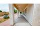 A large covered patio provides ample shaded outdoor space, surrounded by desert landscaping at 10441 W Windsor Ave, Avondale, AZ 85392