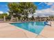 Large community pool offers lounge chairs and shaded seating areas at 1173 E Cochise Dr, Phoenix, AZ 85020