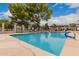 Community pool is fenced and features a pergola-covered seating area at 1173 E Cochise Dr, Phoenix, AZ 85020