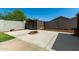 The private backyard features a fire pit and shed, perfect for outdoor living at 1223 E Palo Verde Dr, Casa Grande, AZ 85122
