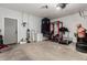The garage features ample space for storage and projects, with visible workout equipment at 1223 E Palo Verde Dr, Casa Grande, AZ 85122