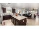 Spacious kitchen featuring a large island, ample counter space, stainless steel appliances, and an open layout at 1223 E Palo Verde Dr, Casa Grande, AZ 85122