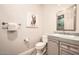 Bright bathroom featuring a vanity with cabinet storage at 12448 N 129Th Pl, Scottsdale, AZ 85259