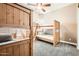 Bedroom with wood bunk beds and a ceiling fan at 12448 N 129Th Pl, Scottsdale, AZ 85259