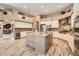 Gourmet kitchen with large center island, stainless steel appliances, and ample cabinet space at 12448 N 129Th Pl, Scottsdale, AZ 85259