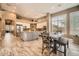 Well-appointed kitchen with a central island, stainless steel appliances, and a cozy breakfast nook at 12448 N 129Th Pl, Scottsdale, AZ 85259