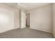 Spacious bedroom with carpeting, a ceiling fan, and closet, ready for personalization at 125 N 22Nd Pl # 53, Mesa, AZ 85213