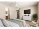 Comfortable primary bedroom with walk in closet and adjoining bathroom at 125 N 22Nd Pl # 53, Mesa, AZ 85213