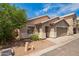 Single-story home with desert landscaping, covered entryway, and an attached two-car garage at 125 N 22Nd Pl # 53, Mesa, AZ 85213