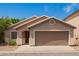 Charming single-story home with a well-maintained yard and a welcoming facade at 125 N 22Nd Pl # 53, Mesa, AZ 85213