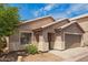 Single-story home with desert landscaping, covered entryway, and an attached two-car garage at 125 N 22Nd Pl # 53, Mesa, AZ 85213
