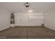 Interior view of an empty two car garage at 125 N 22Nd Pl # 53, Mesa, AZ 85213