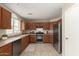 Well-lit kitchen features stainless steel appliances and plenty of counter space at 125 N 22Nd Pl # 53, Mesa, AZ 85213