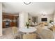 Open floor plan featuring dining area leading to living room and kitchen at 125 N 22Nd Pl # 53, Mesa, AZ 85213