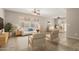 Bright living room with tile floors, natural light, ceiling fan, and neutral decor at 125 N 22Nd Pl # 53, Mesa, AZ 85213