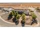 Beautiful home with mature trees providing privacy and desert landscaping at 1409 E Dove Pl, Casa Grande, AZ 85122