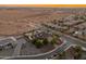 A sprawling residential property seen from an aerial view featuring a pool and plenty of parking at 1409 E Dove Pl, Casa Grande, AZ 85122