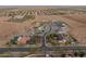 Stately residence showcasing a beautifully landscaped yard and mature trees, creating a welcoming and picturesque curb appeal at 1409 E Dove Pl, Casa Grande, AZ 85122