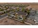 Expansive backyard oasis featuring a pool, gazebo, and basketball court, perfect for outdoor entertainment and recreation at 1409 E Dove Pl, Casa Grande, AZ 85122